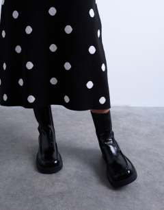 Model wearing Compact knit skirt co-ord in polka dot