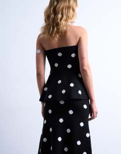 Model wearing Compact knit top co-ord in polka dot
