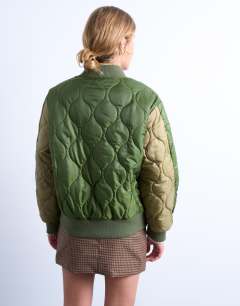 Model wearing Contrast liner bomber jacket in green