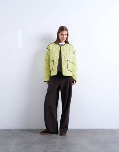 Model wearing Contrast quilted liner in green