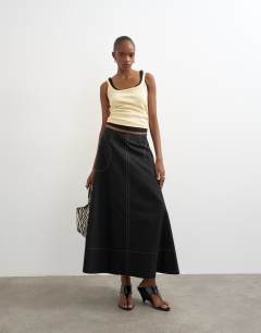 Model wearing Contrast stitch full circle skirt in black