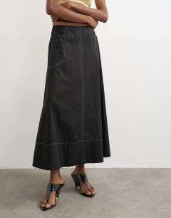 Model wearing Contrast stitch full circle skirt in black