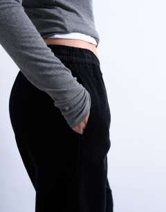 Model wearing Cord pull on jogger in black