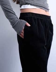 Model wearing Cord pull on jogger in black