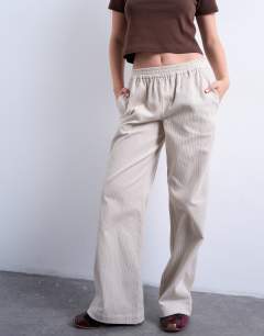 Model wearing Cord pull on jogger in stone