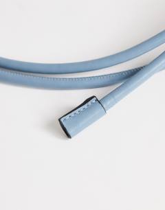 Model wearing Cord style belt in cornflower blue