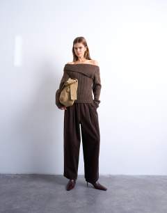 Model wearing Cord wide leg awkward length trouser in brown