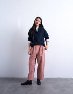 Model wearing Cord wide leg awkward length trouser in pink