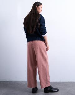 Model wearing Cord wide leg awkward length trouser in pink