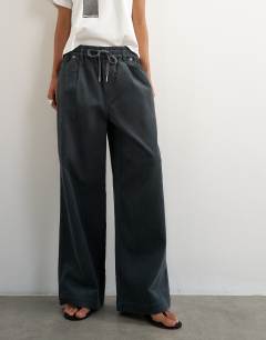 Model wearing Cord wide leg pull on trouser in grey