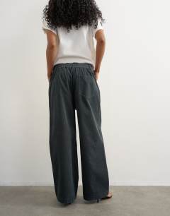Model wearing Cord wide leg pull on trouser in grey