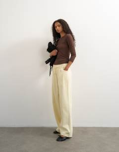 Model wearing Cord wide leg pull on trouser in stone