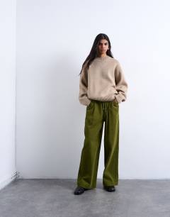 Model wearing Cord wide leg trouser with drawcord in green
