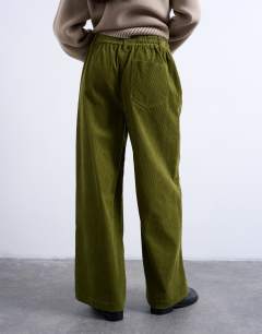Model wearing Cord wide leg trouser with drawcord in green
