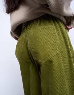 Model wearing Cord wide leg trouser with drawcord in green