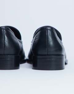 Model wearing Corrie real leather flat shoe loafer in black