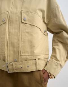 Model wearing Cotton belted biker jacket in stone