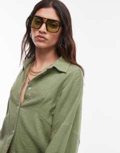 Model wearing Cotton casual angled armhole shirt in khaki