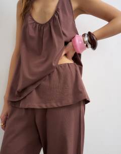 Model wearing Cotton overlay wide leg bottoms co-ord in chocolate
