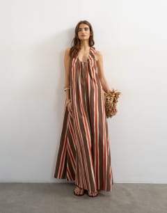 Model wearing Cotton poplin ruched neck maxi sundress in chocolate and red stripe