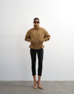 Model wearing Cotton toggle waist zip through jacket in khaki