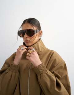 Model wearing Cotton toggle waist zip through jacket in khaki