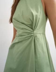 Model wearing Cotton twill racer neck maxi dress with tuck side detail in sage green