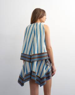 Model wearing Cotton v neck smock mini dress in contrast lime and blue stripe