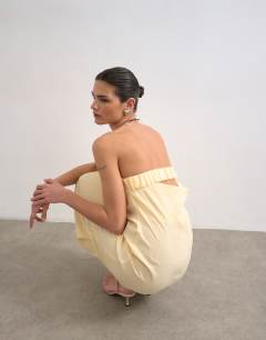 Model wearing Cowl back bandeau midi dress in buttermilk