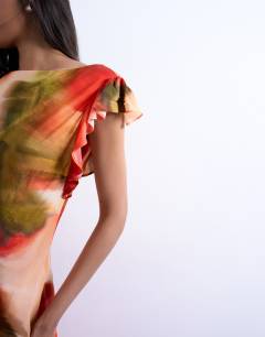 Model wearing Cowl back flutter sleeve maxi dress in abstract floral