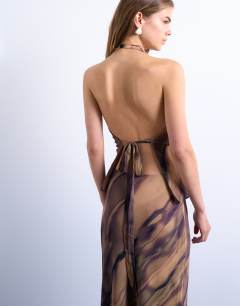 Model wearing Cowl neck halter top in woodgrain