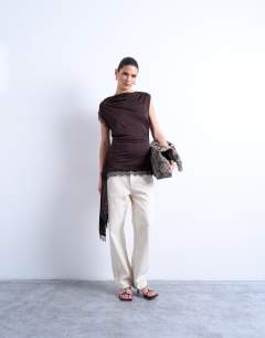 Model wearing Cowl neck lace trim top in chocolate