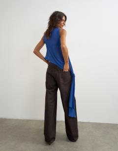 Model wearing Cowl neck tie knot drape top in colbalt blue