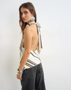 Model wearing Cowl tie detail top in chocolate stripe