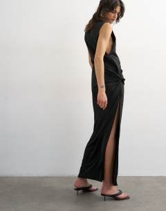 Model wearing Crepe sleeveless twist side maxi dress in black