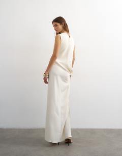 Model wearing Crepe sleeveless twist side maxi dress in ecru