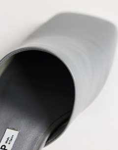 Model wearing Cressida premium real leather square toe mule in grey