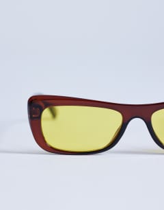 Model wearing Crete cat eye sunglasses in brown