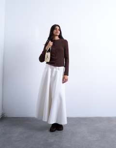 Model wearing Crinkle button down long sleeve top in chocolate brown