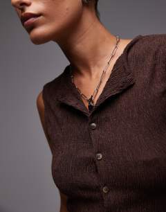 Model wearing Crinkle button down tank in chocolate brown