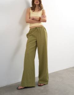 Model wearing Crinkle check drawcord trouser in green