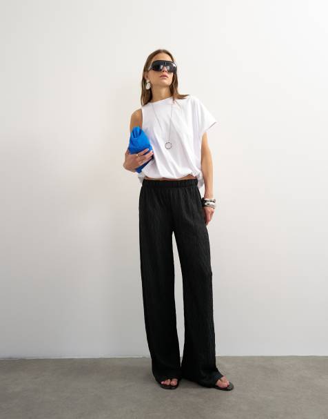 Topshop crinkle jersey wide leg pants in black - view 1