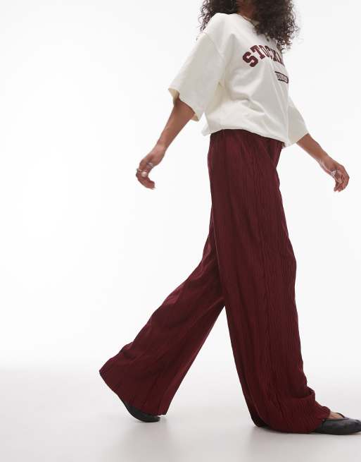 Topshop crinkle plisse wide leg trouser in burgundy ASOS