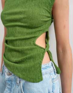 Model wearing Crinkle ruched side cut out sleeveless top in green