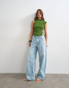 Model wearing Crinkle ruched side cut out sleeveless top in green