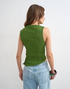 Model wearing Crinkle ruched side cut out sleeveless top in green