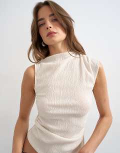 Model wearing Crinkle ruched side cut out sleeveless top in stone