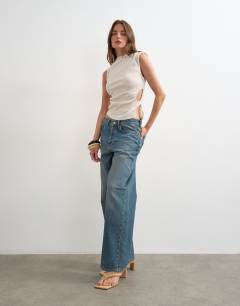 Model wearing Crinkle ruched side cut out sleeveless top in stone