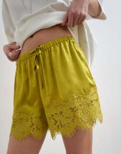 Model wearing Crinkle satin a-line mini short with lace trim in chartreuse 