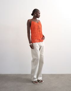 Model wearing Crinkle satin top with lace inserts in rust